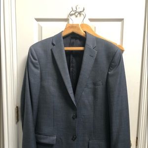 JosA Bank 2-piece gray-blue suit , new condition with original tag in pocket.